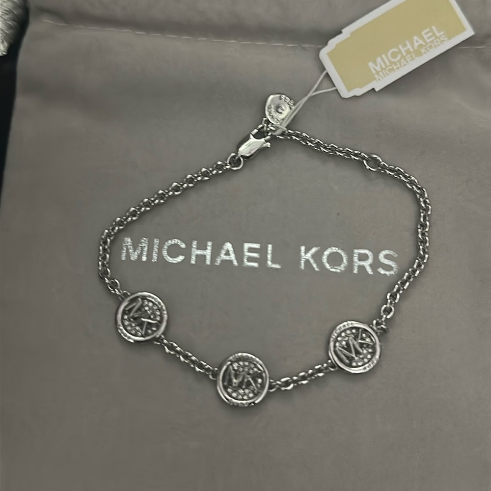 Michael Kors silver pave bracelet.